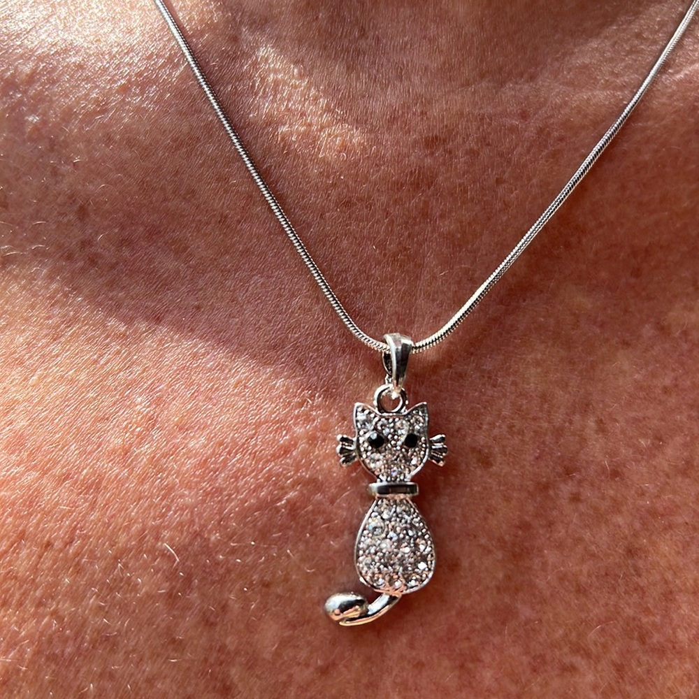 New Clear Crystal Cat necklace on 16”. Chain